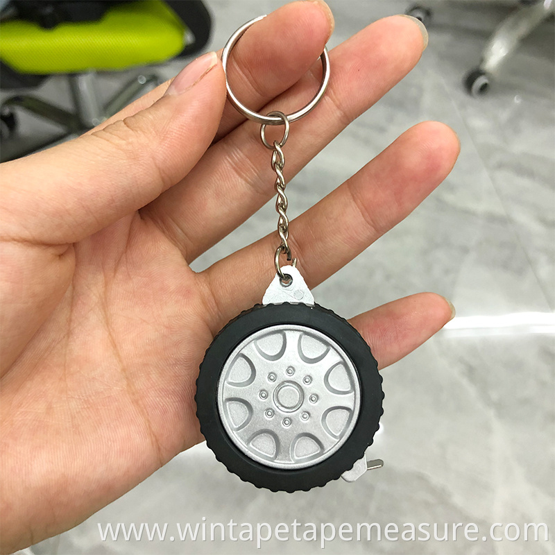 Custom logo printed tire shape measuring tape advertising plastic keychain with mini steel tape measure for promotional gift